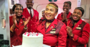 Asha Mohamed with the crew of Kenya Airways. PHOTO/KQ X