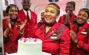 Asha Mohamed with the crew of Kenya Airways. PHOTO/KQ X