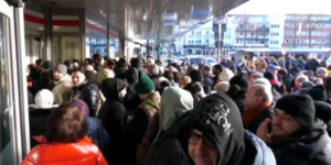 An image of dozens of people captured outside the bank demanding to be let inImage/CNN