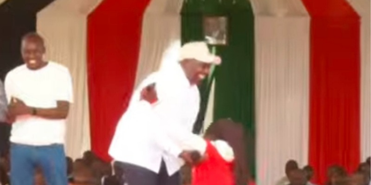 President William Ruto Consoling Emotional Eunice Wanya After Accepting Her Appeal For Laundry Business Start-up. PHOTO/ File