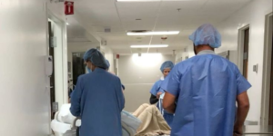 Medical officers helping out a patient in the hospital Image/Pin