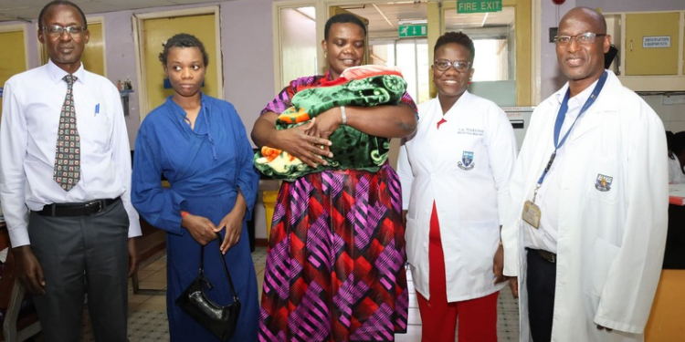 A picture of a mother and her missing daughter surrounded by doctors at KNH PHOTO/KNH/X