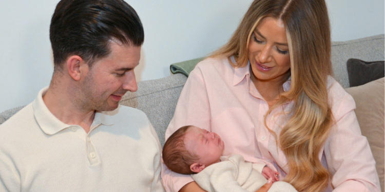 Grace Bell and Steven Powell with their baby son Hugo. PHOTO/ PA Media