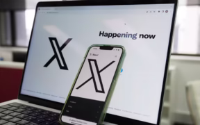 The opening page of X is displayed on a computer and phone, Oct. 16, 2023, in Sydney. (AP Photo/Rick Rycroft, File)