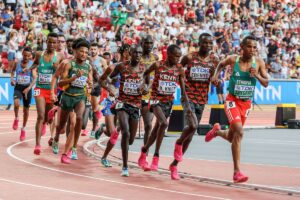 Benard Kibet of Kenya points at the spikes of Ethiopia’s Berihu Aregawi in the men’s 10,000m final at the 2023 World Athletics Championships in Budapest. Photo: Kevin Morris