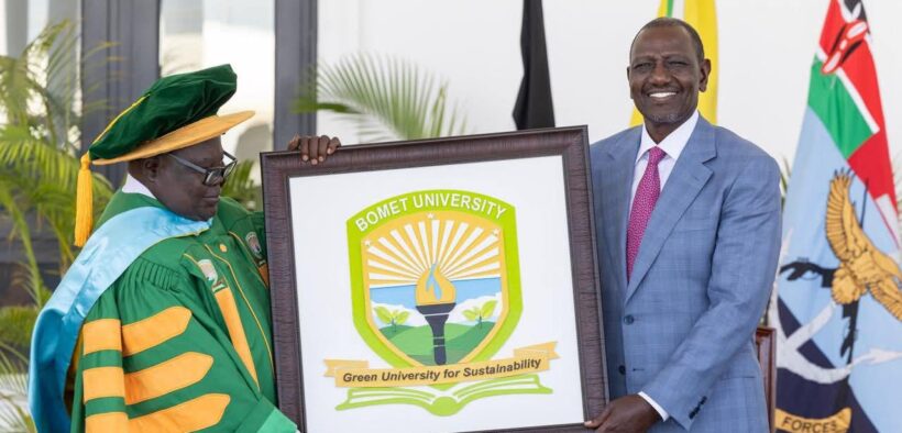Bomet University Chancellor receiving the schoool logo from the president during the a ward of charter ceremony on February 3, 2025 at the State House. PHOTO/@EduMinKenya/X