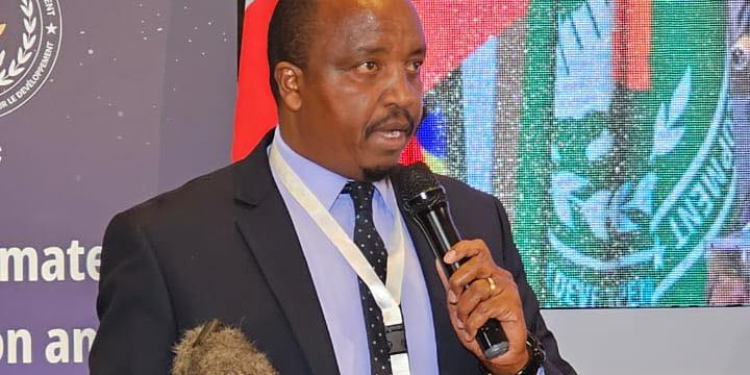 Kenya Met Boss Edward Muriuki speaking at past event. PHOTO/KNA