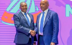 Sports principal secretary Elijah Mwangi with Caf president Patrice Motsepe
