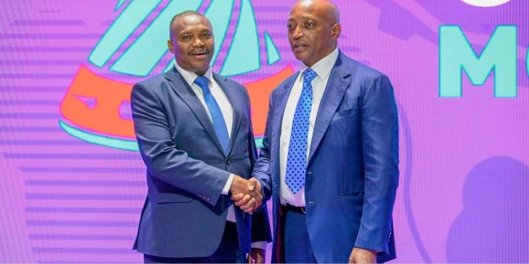 Sports principal secretary Elijah Mwangi with Caf president Patrice Motsepe