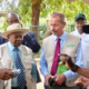 Kakuzi Blueberry Manager Laban Koima (right) explains package features to Investments, Trade and Industry Cabinet Secretary Lee Kinyanjui (second left) during his recent visit to Kakuzi Plc orchards in Murang'a County, as the firm's Chairman Nicholas Ng'ang'a and Managing Director Chris Flowers (right) look on