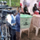 A photo collage of cameras during a past press conference and Observers in Kasarani constituency during the general elections, Nairobi, Kenya, 8 August 2022. PHOTO/KUJ/ Simon Libz/Shutterstock