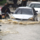 Motorists navigating a heavily flooded road PHOTO/File