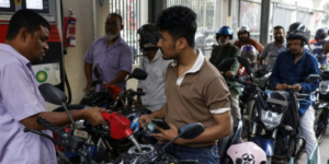 Motorists refueling during rationing PHOTO/Reuters 