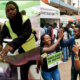 Collage photo of AI generated image of GenZ with placards urging for Voter registration and youths lining up at voter registration centres PHOTO/File