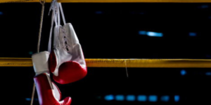 Gloves hanging in a boxing ringPHOTO/File