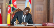 President Ruto signing the bill into law