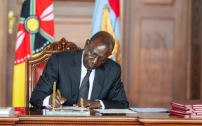 President Ruto signing the bill into law