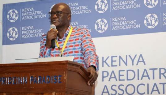 Director General of health Dr. Patrick Amoth Speaking during the official opening of the 25th Kenya Paediatric Association Annual Scientific Conference in Shanzu, Mombasa. PHOTO/ MoH
