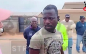 Ghanaian national confronted by a group of South African nationals. PHOTO/ File