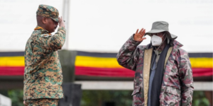 Ugandan President Yoweri Museveni and his son General Muhoozi Kainerugaba perfoming a military salute during a past event in Uganda. PHOTO/ Museveni X