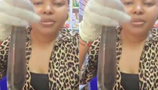 A kenyan lady from Glamaris Pharmaceutical displays the smart condom that is able to detect infection and viruses and changes colour. PHOTO/ File