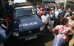 A police land cruiser surrounded by locals at a past crime scene Photo NPS