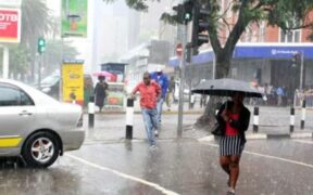A picture of people caught in rainfall in Nairobi