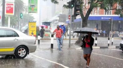 A picture of people caught in rainfall in Nairobi