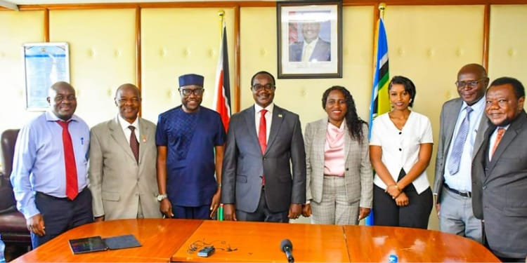 CS Education with other officials posing for a photo at an event.