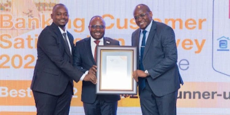 Steve Kirui,Rosemary Nyamwega from Cooperative bank and CEO of KBA PHOTO/File