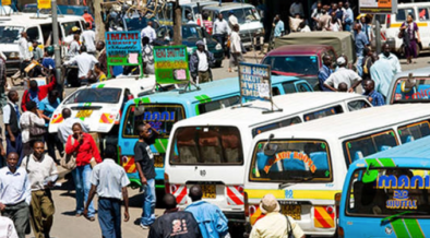 Matatu and passengers at a bus stage in Nairobi. PHOTO/ YORK.