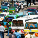 Matatu and passengers at a bus stage in Nairobi. PHOTO/ YORK.