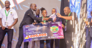Interior CS Kipchumba Murkomen presenting an award to winners of the NIRU AI Hackathon 2025. PHOTO/NIRU
