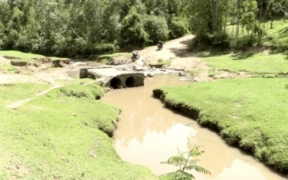 Collapsed Sigowet River Bridge in Narok West after heavy rains washed it away, cutting off the Ngiito–Olereut route and disrupting transport, livelihoods, and school access.