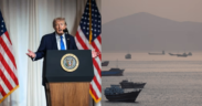 Photo collage of President Donald Trump and the Cargo ships seen at the Strait of Hormuz PHOTO/File