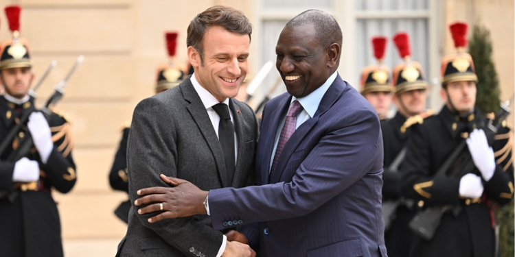 French President Emmanuel Macron shakes hands with Kenya’s President William Ruto, prior to a meeting at the Elysee Presidential Palace in Paris, on January 24, 2023. PHOTO/ Emmanuel DUNAND / AFP
