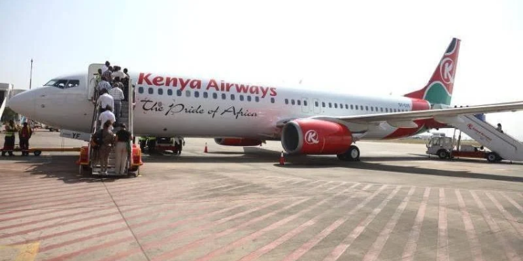Passengers Board Kenya Airways Plane at the JKIA PHOTO/The Standard