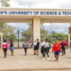 Kiriri Women's University students walking past the main entrance gate. PHOTO/ Kiriri