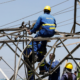 Kenya power workers working on a power line PHOTO/Standard