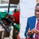 A photo collage of Energy CS Opiyo Wandayi and a fuel attendant with the pump