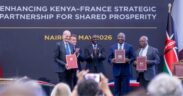 President William Ruto and President Emmanuel Macron of France stand alongside senior French and Kenyan government ministers and diplomats during a bilateral signing ceremony at State House Nairobi. PHOTO/Equity X