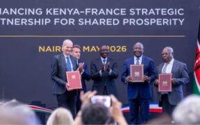 President William Ruto and President Emmanuel Macron of France stand alongside senior French and Kenyan government ministers and diplomats during a bilateral signing ceremony at State House Nairobi. PHOTO/Equity X