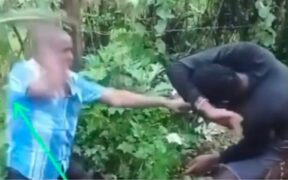 The married man beating another man he found in his house PHOTO/FB
