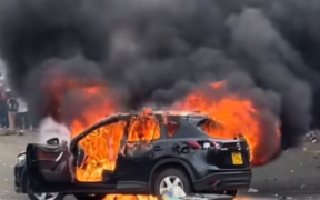 A photo showing Priscilla Larweh Martey's black Mazda CX-5 engulfed in flames. Photo/ Priscilla Larweh/ fb