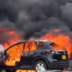 A photo showing Priscilla Larweh Martey's black Mazda CX-5 engulfed in flames. Photo/ Priscilla Larweh/ fb