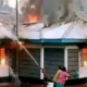 An AI image of a house on fire for illustration purposes. PHOTO/AI