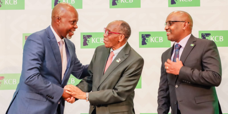 KCB Group Chairman Joseph Kinyua(middle), KCB Group Plc Chief Executive Officer Paul Russo during the release of the group's first quarter financial statement at the Nairobi Securities Exchange. PHOTO/ File