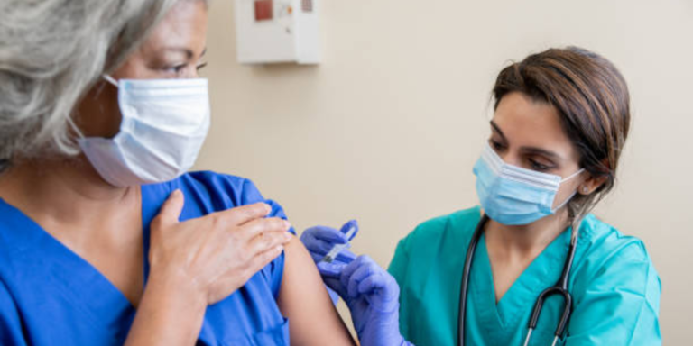 A Healthcare Worker administering a vaccination jab to a patient. PHOTO/ File