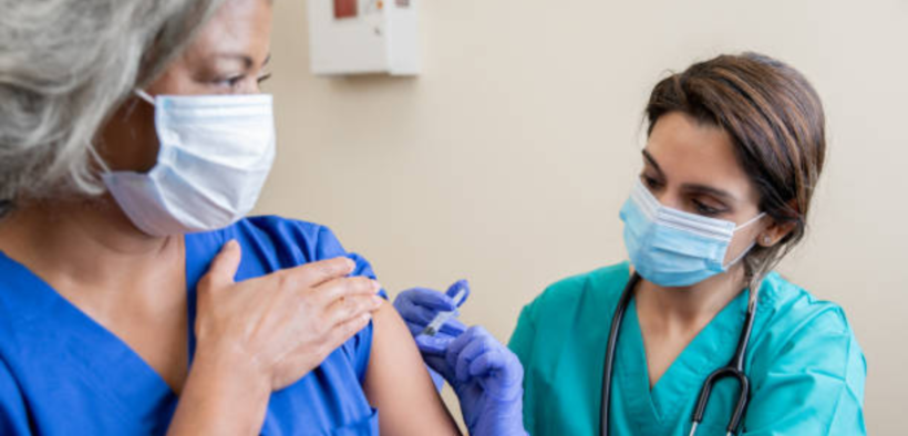 A Healthcare Worker administering a vaccination jab to a patient. PHOTO/ File