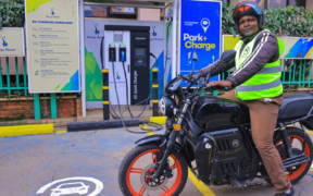A motorbike rider with an electric bike in a KPLC charging station in Nairobi. PHOTO/ File